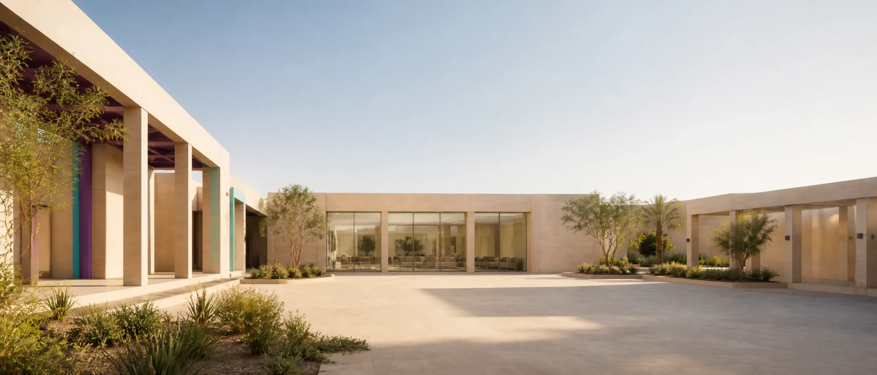 An expansive courtyard at a modern Saudi education and rehabilitation campus